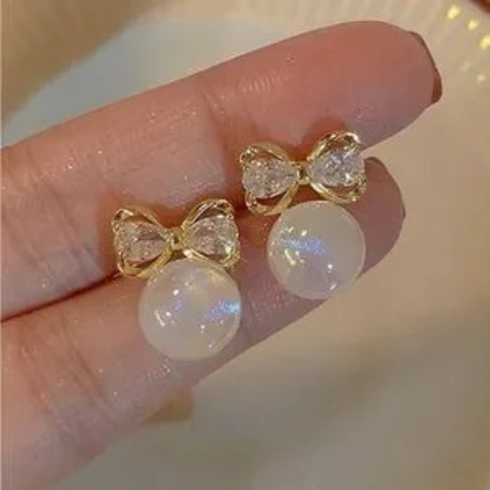 Gold and White Bow Pearl Earrings - Picture 1 of 1